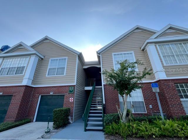 Photo of 13028 Plantation Park Circle #1228, Orlando, FL 32821 (MLS # O6449549)