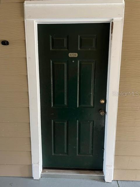 Photo of 13028 Plantation Park Circle #1228, Orlando, FL 32821 (MLS # O6449549)