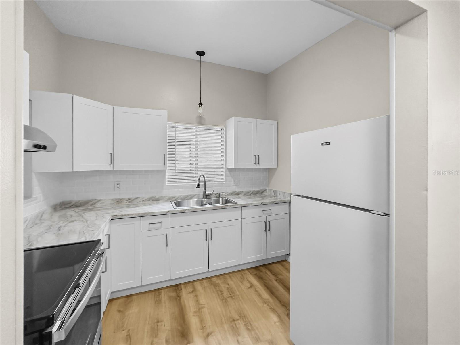 5715/5711 GALLATIN LANE