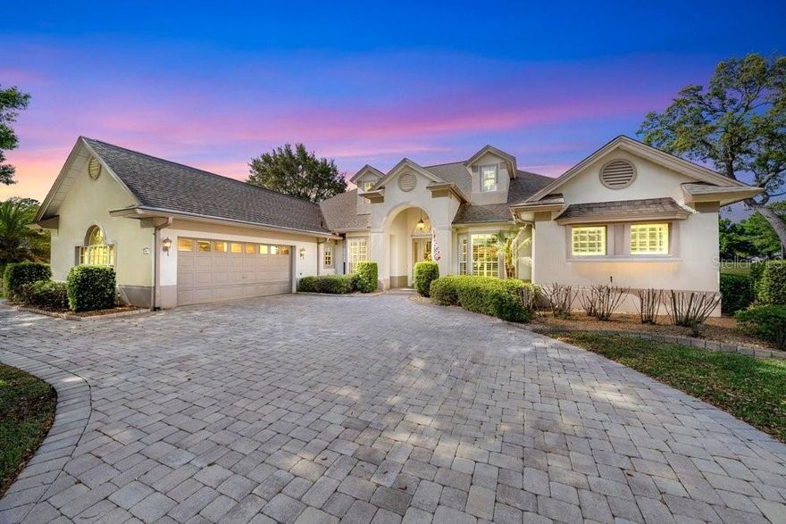 Golf-Front Perfection on Greenbriar Trail | Country Club of Mount Dora
The Ultimate Fairway Retreat
Experience understated elegance in this custom 2,970 sq. ft. estate, perfectly positioned on the 10th fairway of the Country Club of Mount Dora. Located on the highly sought-after Greenbriar Trail, this home makes a striking first impression with a curved paver driveway, crisp stone edging, and professional landscaping.
Sophisticated Interior
The seamless floor plan is bathed in natural light, featuring soaring ceilings, crown molding, and plantation shutters throughout. Designed for both daily comfort and grand entertaining, the home offers a formal dining room with a unique prism-glass skylight and a dedicated executive office for the remote professional. The chef’s kitchen—complete with granite countertops, stainless appliances, and a central island—flows effortlessly into a spacious family room anchored by a cozy fireplace.
A Private Sanctuary
The primary suite is a true retreat, featuring direct pool access, a private sitting area, and a walk-in closet with a custom folding table. The 2022-remodeled spa bath offers an oversized soaking tub and a modern walk-in shower. For ultimate privacy, two guest bedrooms are located on the opposite wing, connected by a Jack-and-Jill bath.
Seamless Indoor-Outdoor Living
Step through disappearing pocket sliders to your backyard oasis. The all-new "Clear-Span" screened lanai offers unobstructed views of the rolling greens, featuring a summer kitchen, sparkling pool, and outdoor shower. Practicality meets luxury with an oversized garage that includes dedicated rear golf cart access.
Turn-Key & Worry-Free
This home has been meticulously updated for peace of mind:
• Whole-House Generator for uninterrupted power.
• Whole-Home Replumb (2022).
• New Water Heater (2022).
• 3-Year-Old AC System.
• Brand-New Pool Pump (2026).
• 400,000 BTU pool heater (2022)