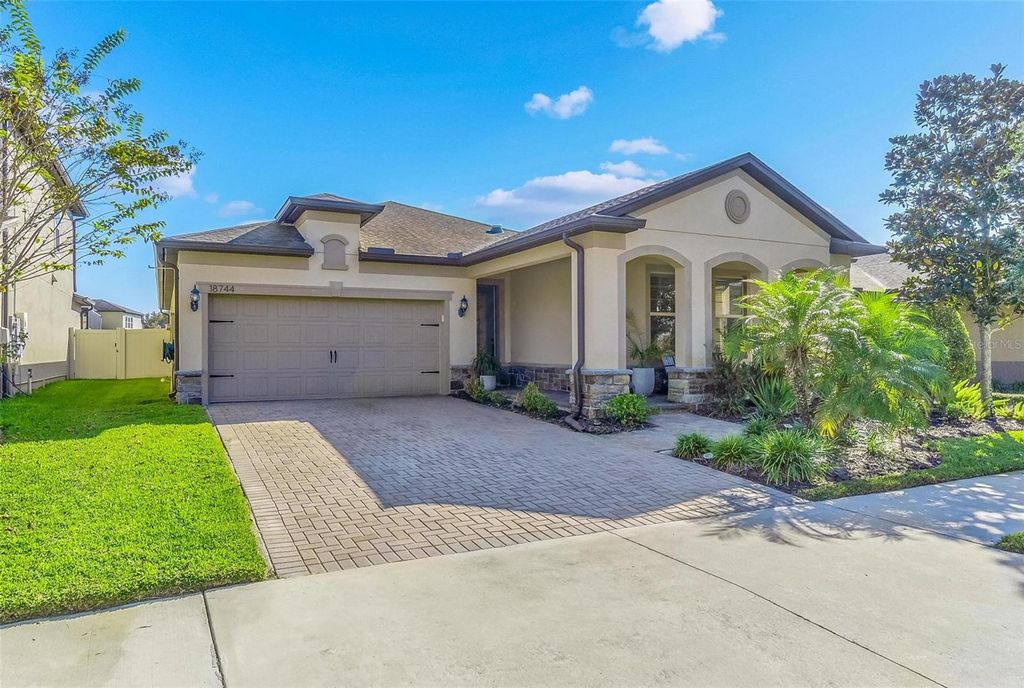 Photo of 18744 Birchwood Groves Drive, Lutz, FL 33558 (MLS # TB8509220)