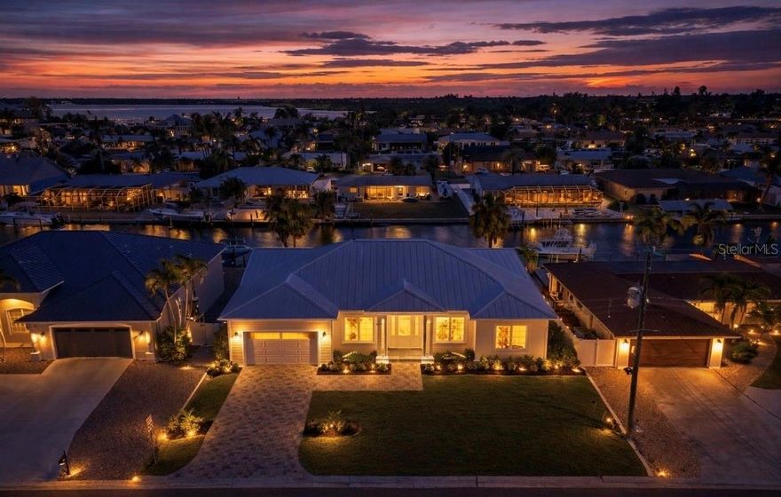 Build your waterfront dream home! This waterfront lot is ready to build and has NEVER FLOODED during hurricanes. This lot features a new concrete seawall and stunning waterfront views. San Remo Shores is nestled on the south side of Palma Sola Bay in West Bradenton. With a 5' deep 75' wide canal, this location is a boater's paradise with direct access to Tampa Bay, Sarasota Bay, and the Gulf of Mexico via its unobstructed canals. Residents enjoy stunning waterfront views- minutes to Anna Maria Islands white sandy beaches as well as downtown Bradentons dining, shopping, and cultural attractions. Vacation rentals are allowed in this community—making it an ideal opportunity for a personal retreat or investment property.