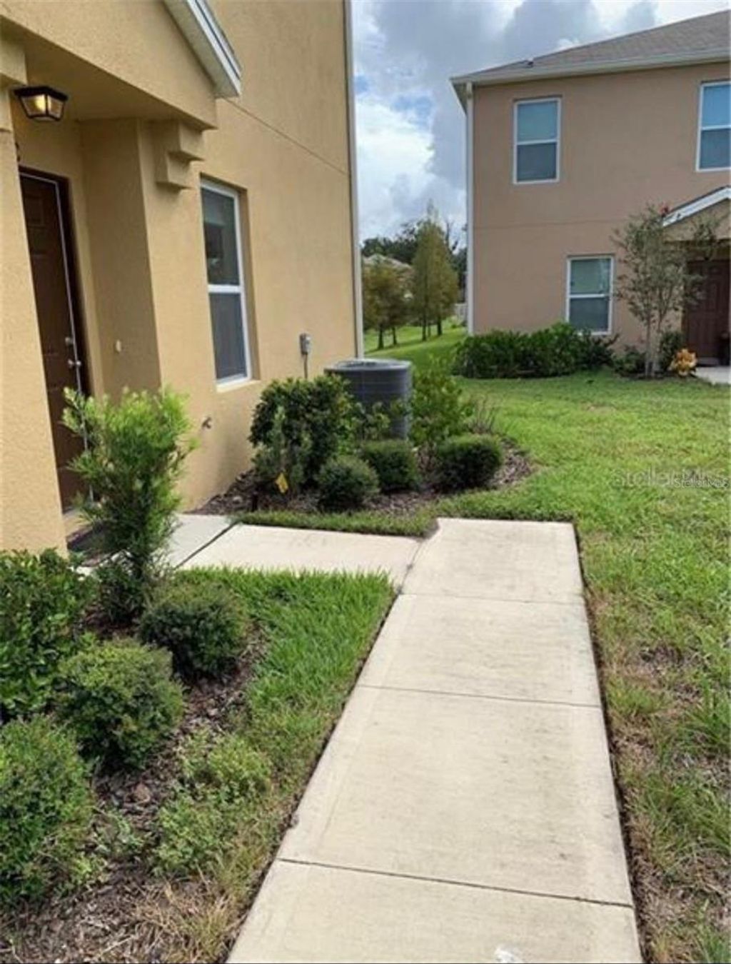 Photo of 3740 Seneca Club Loop, Orlando, FL 32808 (MLS # O6373387)