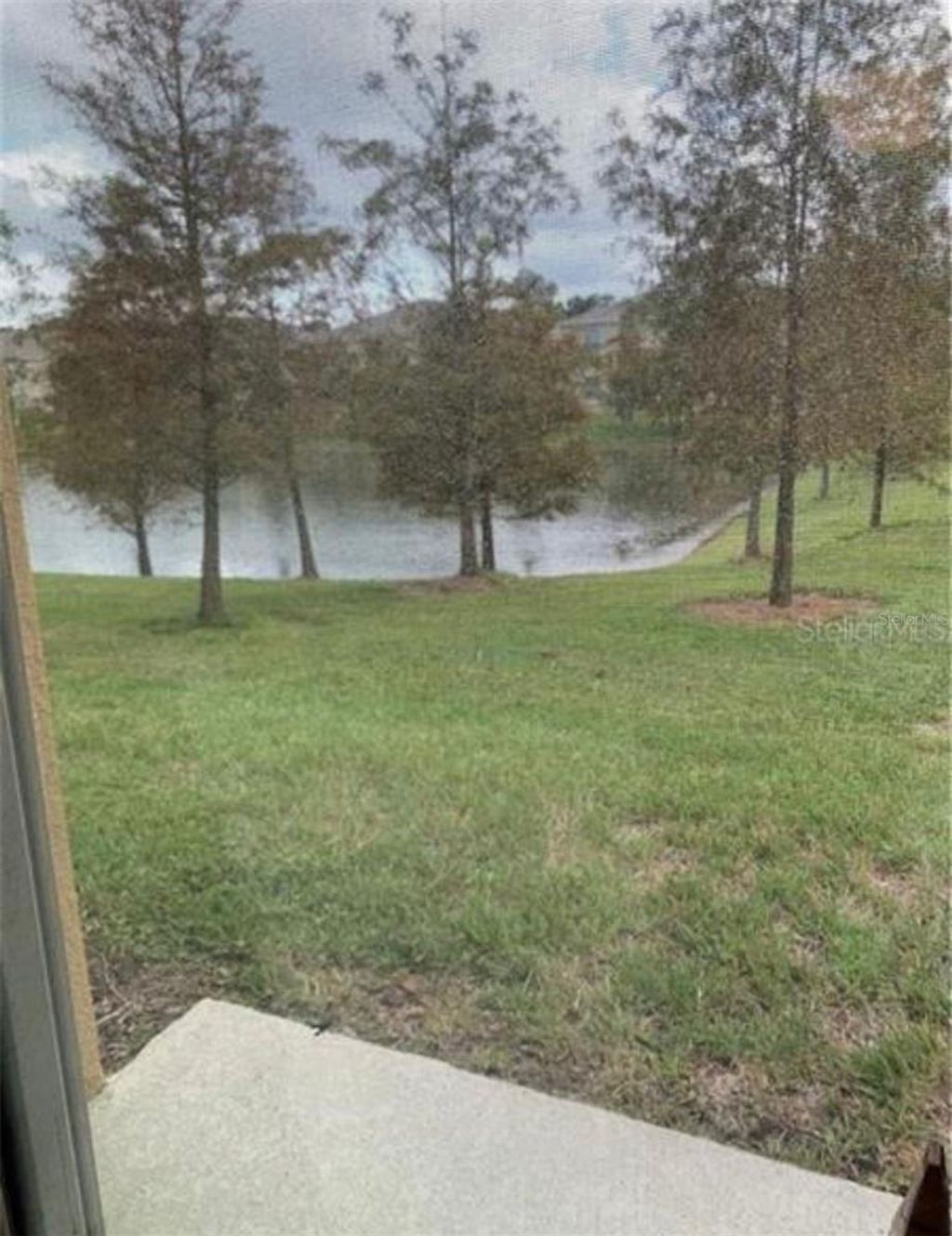 Photo of 3740 Seneca Club Loop, Orlando, FL 32808 (MLS # O6373387)