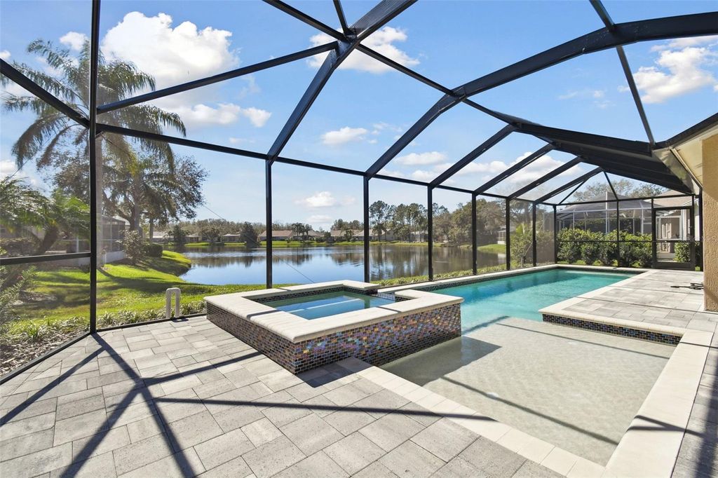 Photo of 10115 Whisper Pointe Drive, Tampa, FL 33647 (MLS # TB8350035)