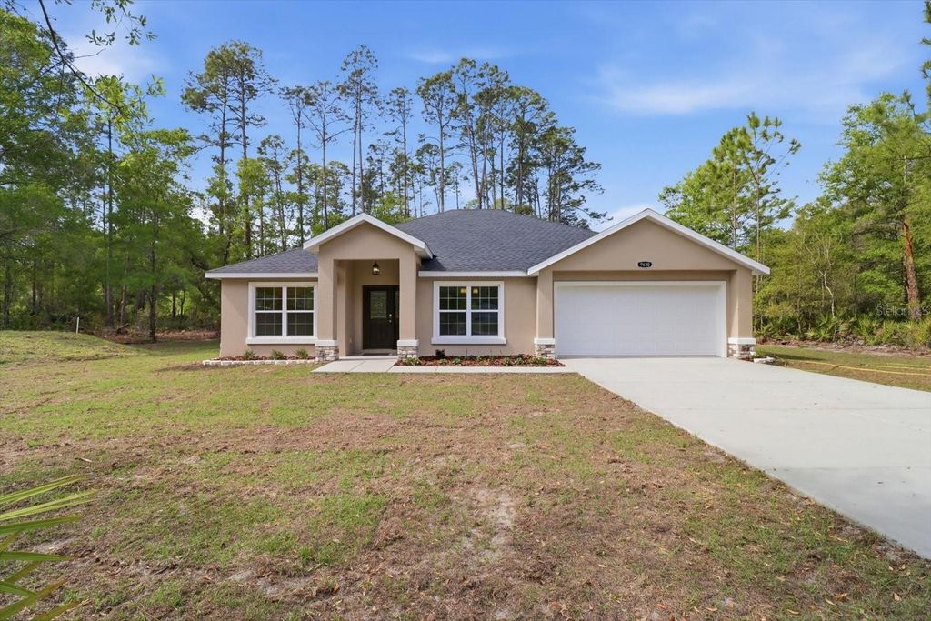 Photo of 9620 N Goldenbell Way, Crystal River, FL 34428 (MLS # OM721840)