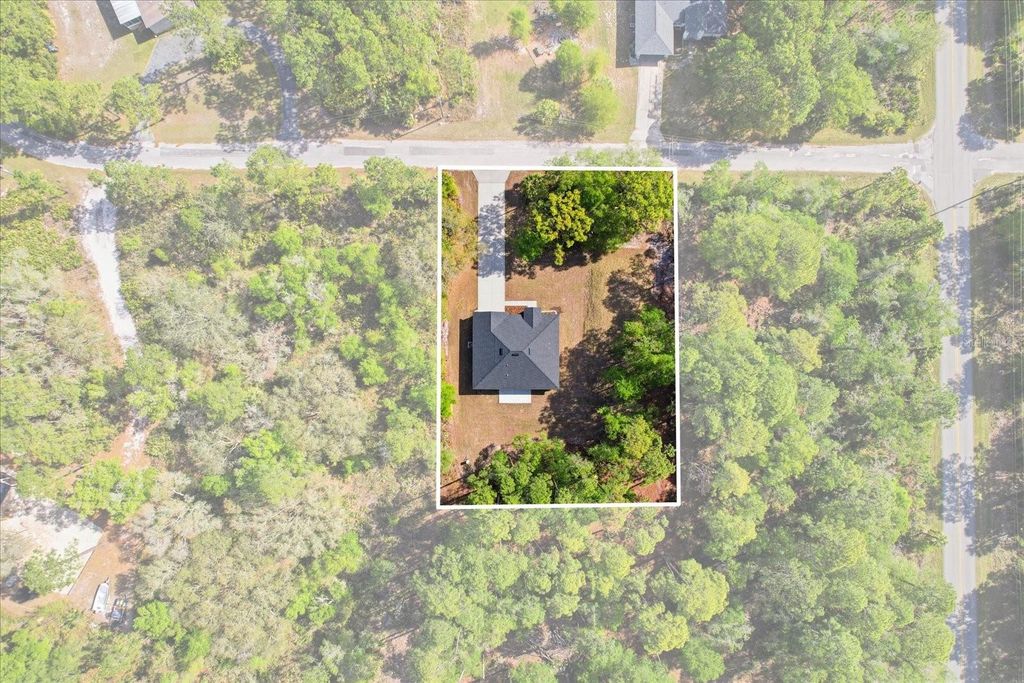 Photo of 9620 N Goldenbell Way, Crystal River, FL 34428 (MLS # OM721840)