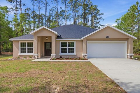 Photo of 9620 N Goldenbell Way, Crystal River, FL 34428 (MLS # OM721840)