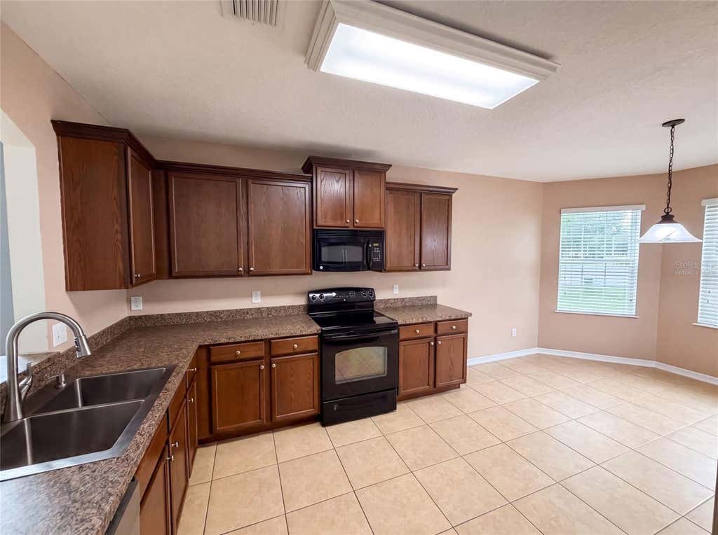 Photo of 12902 Scout Court, Grand Island, FL 32735 (MLS # O6430590)