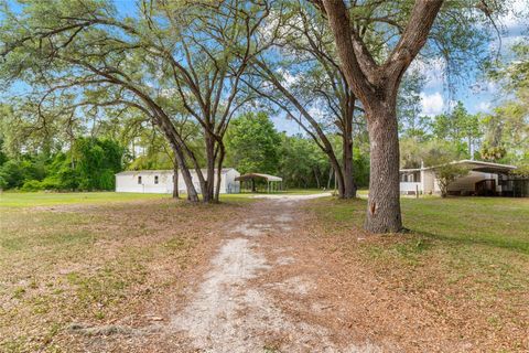 Photo of 8535 SW 155th Street, Dunnellon, FL 34432 (MLS # OM723951)