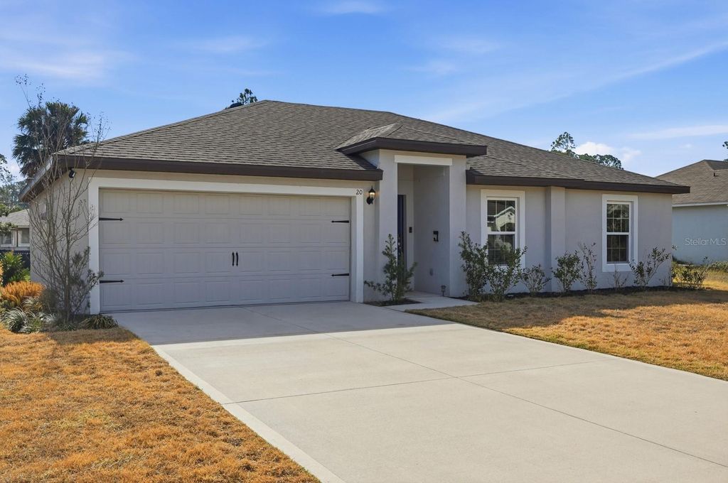Photo of 20 Post Oak Lane, Palm Coast, FL 32164 (MLS # V4947401)