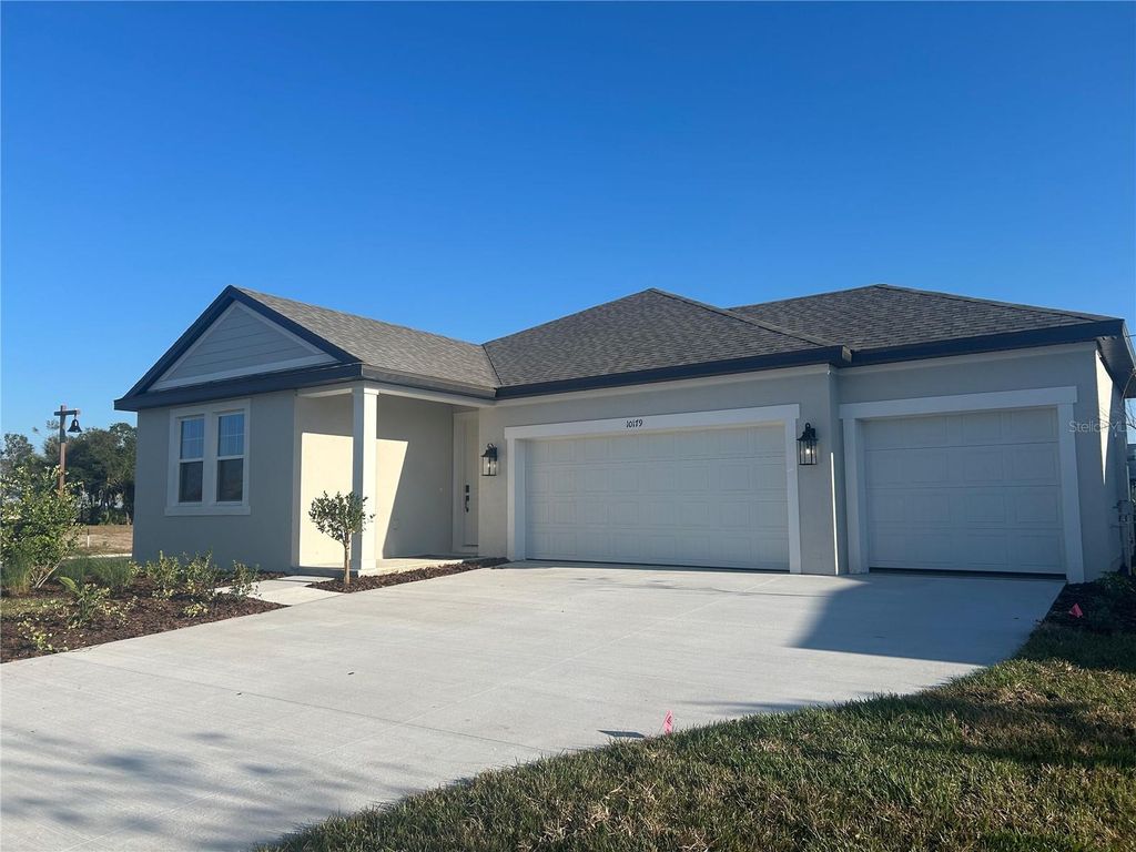 Photo of 10179 Hidden Hammock Loop, Parrish, FL 34219 (MLS # TB8439772)