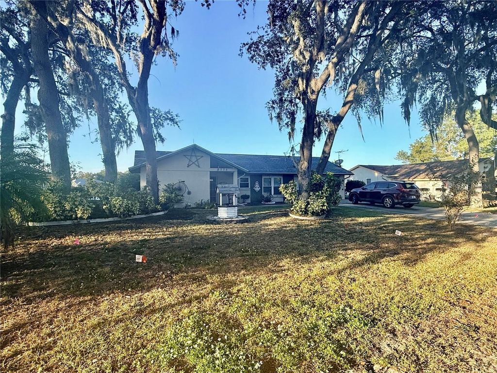 Photo of 8775 Heather Boulevard, Weeki Wachee, FL 34613 (MLS # TB8448983)