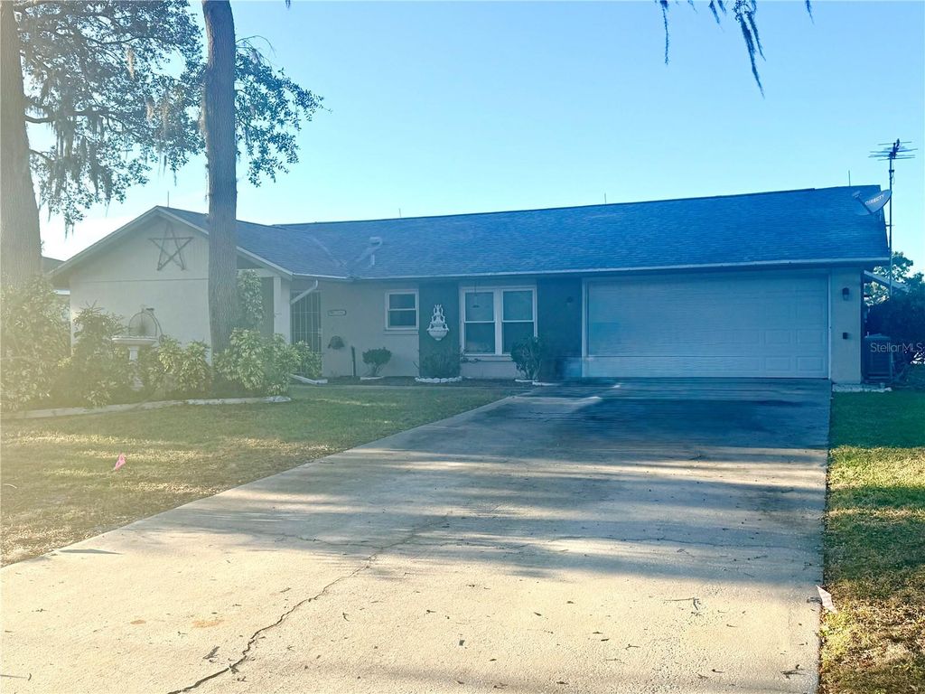 Photo of 8775 Heather Boulevard, Weeki Wachee, FL 34613 (MLS # TB8448983)