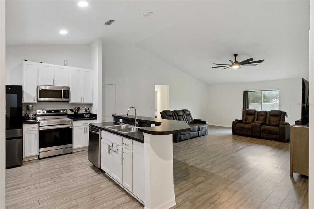 Photo of 1041 Brooks Way, Winter Haven, FL 33880 (MLS # O6430273)