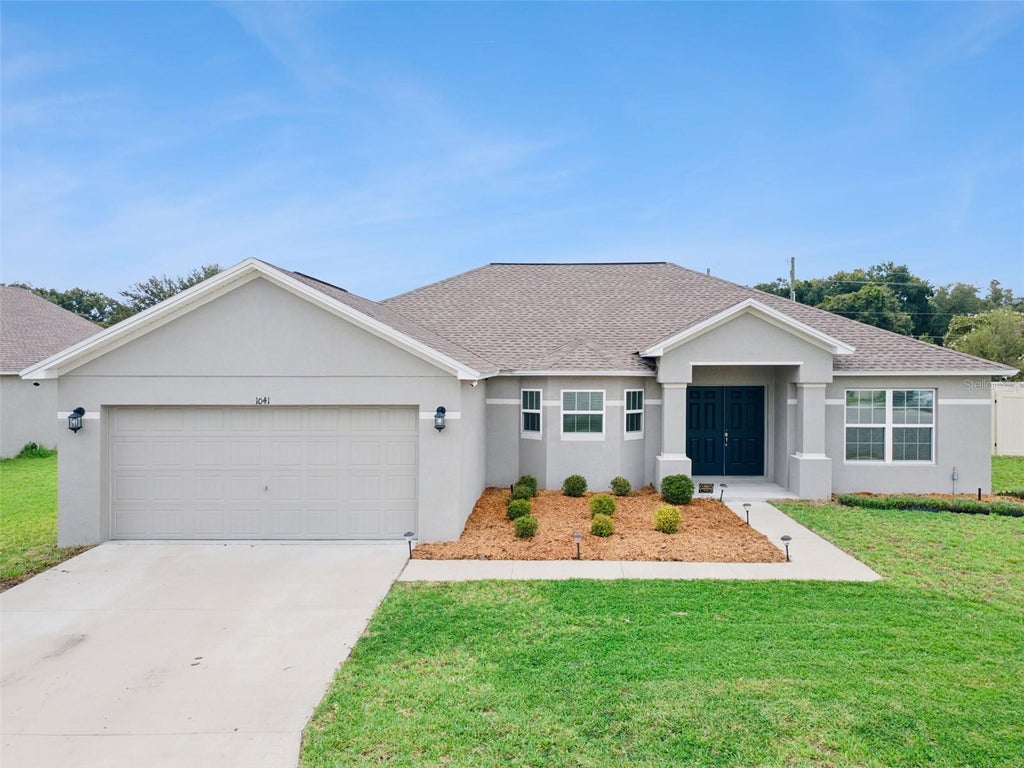 Photo of 1041 Brooks Way, Winter Haven, FL 33880 (MLS # O6430273)