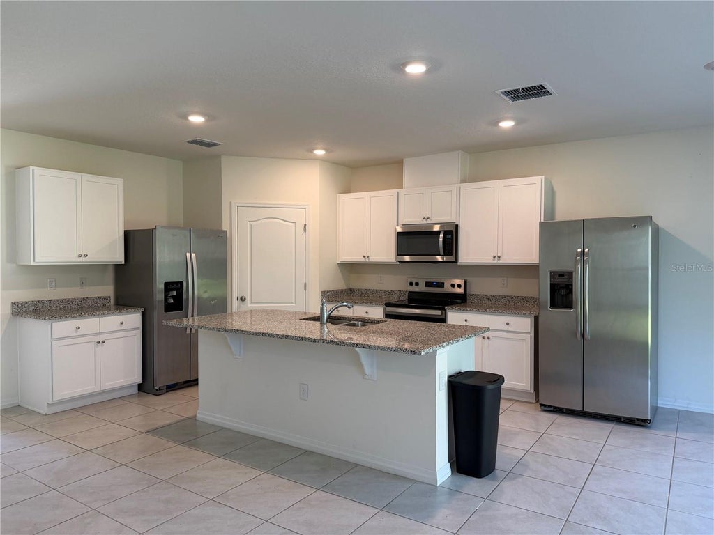 Photo of 682 Park Place Boulevard, Davenport, FL 33837 (MLS # S5160469)