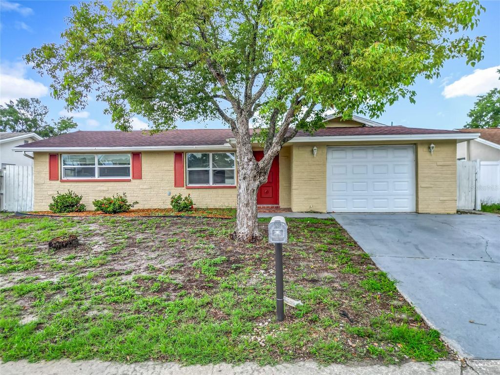 Photo of 7125 Sandalwood Drive, Port Richey, FL 34668 (MLS # TB8400804)