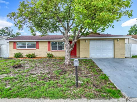 Photo of 7125 Sandalwood Drive, Port Richey, FL 34668 (MLS # TB8400804) Photo of 7125 Sandalwood Drive, Port Richey, FL 34668 (MLS # TB8400804)
