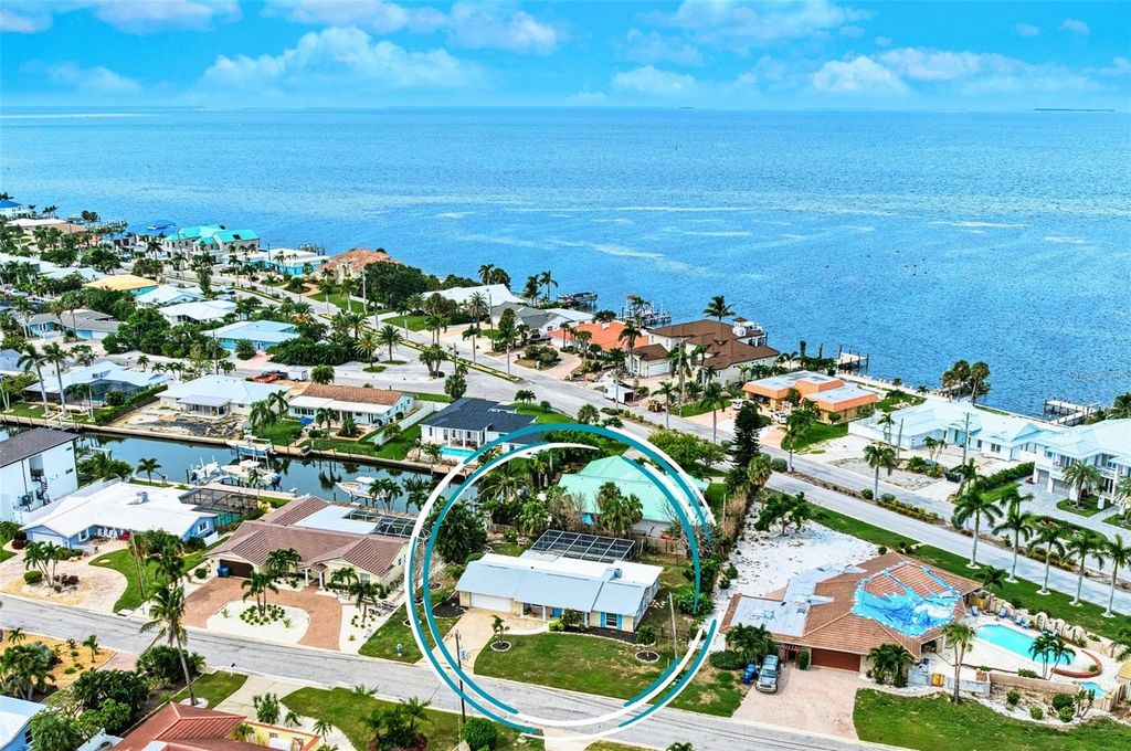 Photo of 609 Foxworth Lane, Holmes Beach, FL 34217 (MLS # A4638909)