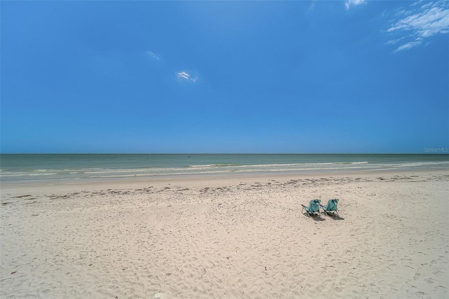 OUTSTANDING OCEANFRONT Opportunity at the TIDES BEACH CLUB giving you a NEW SUNSET PICTURE EACH DAY. Blaring FLOOR TO CEILING VIEWS of white Sandy beach, turquoise waters, and an amazing story of its History. one of the MOST POPULAR EXCLUSIVE 10 Acre-LUXURY BEACHFRONT GATED COMMUNITIES in Pinellas County. Offering RESORT STYLE AMENITIES NEWLY RENOVATED and upgraded to include- UPGRADED CLUBHOUSE offering NEW technology FITNESS EQUIPMENT, conference room, Billiards, Library, 3-Heated tranquil BEACHFRONT POOLS, Grilling Areas, 24-HR SECURITY, onsite Mgmt, NEW ROOFS & Landscaping.  BUT WAIT- a Beach 
RE-Nourishment project has just been completed leaving APPROXIMATELY 11,000 FEET OF PRISTINE SOFT WHITE SAND, solidifying why so many love living at the TIDES BEACH CLUB.


As you walk thru the NEW Entrance Door of this COMPLETELY & TASTEFULLY RENOVATED 2bdrm 2 bath Beachfront unit you’ll SEE the OCEAN immediately. This PRISTINE CONDITION unit has NEVER HAD SHOES WALKED ONTO the unit. Crown Molding with Imported Italian porcelain tile greats you with BREATHTAKING OCEAN VIEWS and SUNSETS DAILY from your kitchen, Living room & Primary bedroom. The Newly renovated kitchen is appointed with an abundance of custom wood white cabinets soaring from Ceiling to floor with Upper, Counter and Floor lighting, hands-free waste receptacle and beautiful White Quartz counter tops stretched across offering a breakfast bar with extra cabinetry, and NEWER APPLIANCES including an INDUCTION Stove top. This home is thoughtfully hard-wired for Ethernet, Bluetooth and plumbed for soft water treatment. All NEW HURRICANE SLIDER Doors and impact WINDOWS for your protection and insurance deduction. Electric Hurricane Shutters on all Sliders, an expansive Balcony stretching the entire width of the unit giving room and protection for your Luxury outdoor furniture. The renovated Primary suite opens to the private balcony overlooking the UNOBSTRUCTED WATER,  a large bathroom suite with an expansive walk-in shower, double sink vanity, recessed lighting, and a re-configured closet with built-ins plus a full wall allowing extra placement of furniture. The guest bath offers seamless glass at the tub/shower with similar renovations.
This unit has unobstructed views, pride of ownership, extra storage closet conveniently located across the unit entrance, under building parking, secured lobby entrance, with a gated entrance to the Tides Beach Club compound.


The building has onsite mgmt., solid financials, and the monthly maintenance fee of $1448 includes, water,trash,cable, internet,24hr security, manager, maintenance of exterior,pool,clubhouse, insurance etc. The location of the Tides Beach Club is perfectly located between Clearwater Beach and St Pete beach, just 20 min either way and approximately 30 minutes to the Airport. You will love everything about this unit and the Tides Beach club. Reserve your showing today.


RENOVATION UPGRADES INCLUDE-New complete kitchen 2022, appliances 2022, Porcelain tile flooring 2022, Primary bathroom- shower, double vanity, faucets, fixtures, lighting, closet 2022, Guest Bath-New Tub, shower tile, glass, vanity, fixtures, toilet 2022, New hurricane rated slider doors 2025, impact windows 2025, AC 2025, hot water heater2025.