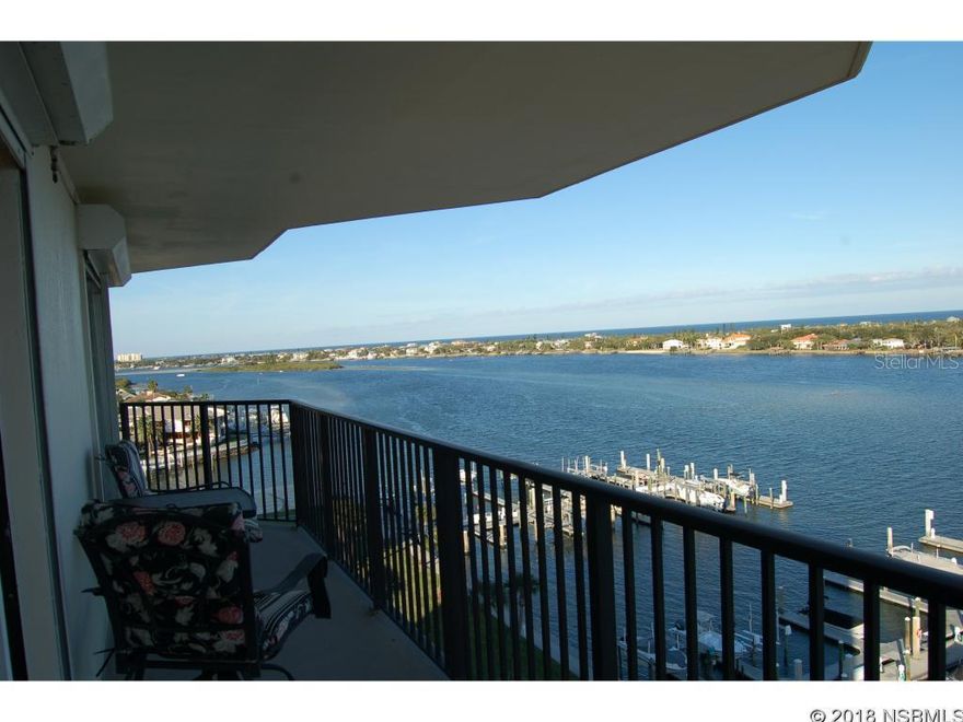 THIS PLACE HAS IT ALL!  VIEWS FROM EVERY WINDOW, COVERED WRAP AROUND BALCONIES, HUGE BOAT SLIP ON THE INTER-COASTAL, 2 GARAGE PARKING SPACES, GATED COMMUNITY, POOL, ON-SITE GYM, TENNIS COURTS, DOG PARK, CLUB HOUSE, BBQ AREA, FIRE PITS AND IT'S ALL WITHIN WALKING DISTANCE TO THE FAMOUS FLAGER AVE AND BEACH!!Don't miss this opportunity to own a condo with balconies and views of the Inter-Coastal Waterway & Atlantic Ocean that sits on 5 acres, that is  landscaped, loaded with everything and is centrally located from all that New Smyrna has to offer. ;LocationDescription: Condo ;Water: City
