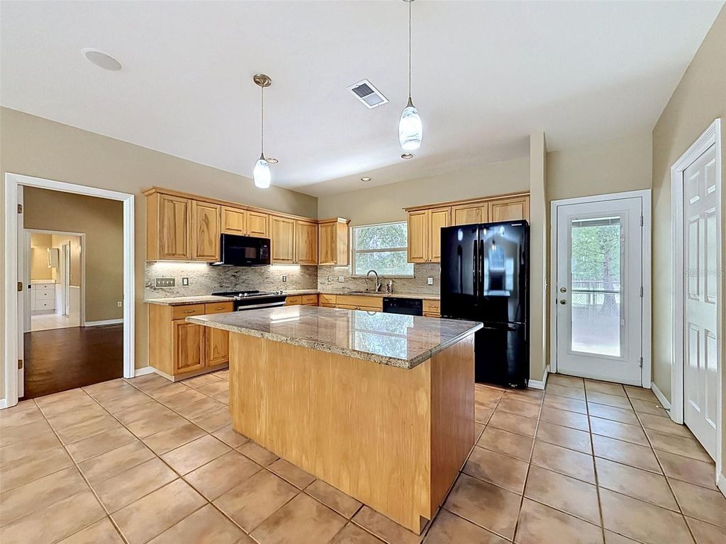 Photo of 3245 Rackley Road, Brooksville, FL 34604 (MLS # W7885345)