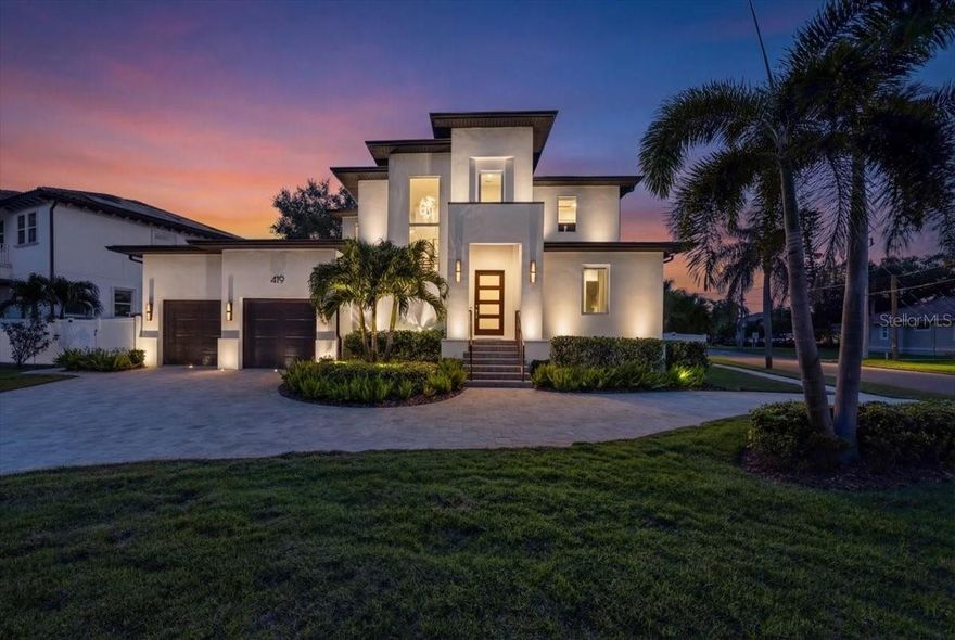 Welcome to a stunning 2022 custom residence by Devonshire Custom Homes, ideally situated on a corner lot in Snell Isle, one of St. Petersburg’s most coveted neighborhoods. This elevated 4 bedroom, 4.5 bath home offers over 3,100 square feet of refined living space with thoughtful architecture and unparalleled attention to detail. Designed for both everyday living and grand entertaining, the open-plan kitchen features an oversized island, premium finishes, and seamless flow into expansive living spaces. Retreat outdoors to your private tropical oasis — complete with a gorgeous covered lanai perfect for dining and social gatherings. The elevated design provides peace of mind and added comfort. Snell Isle living means proximity to waterfront parks, cultural attractions, dining, and boutique shopping — within minutes of downtown St. Pete. Experience modern luxury and coastal Florida lifestyle at its finest.