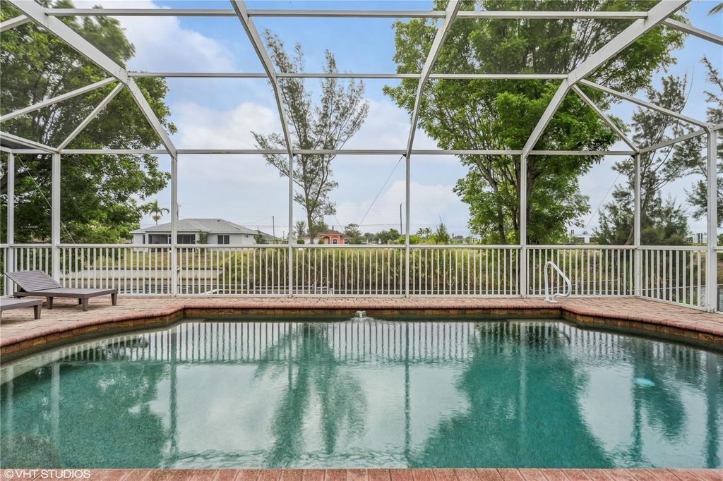 Photo of 2221 SW 8th Court, Cape Coral, FL 33991 (MLS # TB8390936)