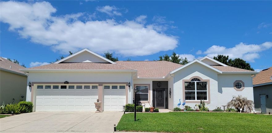 Welcome to the Plantation at Leesburg, an exceptional golf course community where resort-style living meets everyday comfort. This impeccably maintained home offers an impressive 2,227 square feet, featuring 3 bedrooms, 2.5 baths, a 2-car garage, plus a dedicated golf cart garage—perfect for embracing the lifestyle this vibrant community offers.
From the moment you arrive, you’ll be drawn in by the inviting screened front porch—an ideal place to relax and unwind. Step inside to discover a bright, open floor plan with soaring ceilings and a spacious family room designed for both comfort and entertaining. To the left, a formal dining room flows seamlessly into a light-filled kitchen, creating distinct yet connected spaces perfect for hosting gatherings.
This beautifully updated home showcases laminate flooring, ceramic tile, and stylish wood-look tile throughout. The oversized glass-enclosed lanai is a true highlight—perfect for enjoying your morning coffee or winding down in the evening with peaceful views of the meticulously maintained backyard.
The kitchen is a dream for both cooking and entertaining, featuring stainless steel appliances, a brand-new range (2026), refrigerator (2025), newly refaced cabinetry, updated hardware, new disposal and faucet, and stunning new quartz countertops. Under-cabinet LED lighting and updated plumbing add both style and functionality. A breakfast bar and charming nook overlooking the lanai provide additional seating and a cozy dining space.
Just off the kitchen, the spacious den with wood-look tile and a new window shade offers the perfect flex space for a home office, media room, or quiet retreat.
This home features two generously sized primary suites—ideal for guests or multi-generational living. The main suite offers double closets, dual sinks, new quartz counters, a large walk-in shower, and updated plumbing. The second suite includes its own ensuite bath with a tub/shower combination, dual sinks, and matching upgrades. A third bedroom provides versatility as a guest room, office, or creative space.
Major updates provide peace of mind, including a new roof (2022), newer AC (2016), new smoke detectors, thermal expansion valve on the water heater, and new screens on both the front porch, Lanai and all the windows.
Life at the Plantation at Leesburg means access to an incredible array of amenities. Enjoy two championship 18-hole golf courses, three clubhouses, three pools, tennis, pickleball, shuffleboard, fitness centers, a restaurant, golf pro shop, and countless social clubs and activities. From scenic walking paths and abundant wildlife to hobby groups and social events, there’s truly something for everyone.
Ideally located just 1.5 miles from The Villages—without the high price tag—and with convenient access to the Turnpike, shopping, dining, and healthcare, this home also places you about an hour from both Florida coasts.
This is more than just a home—it’s a lifestyle. Come experience the perfect blend of comfort, elegance, and community. Don’t miss your opportunity to make this exceptional property your own!