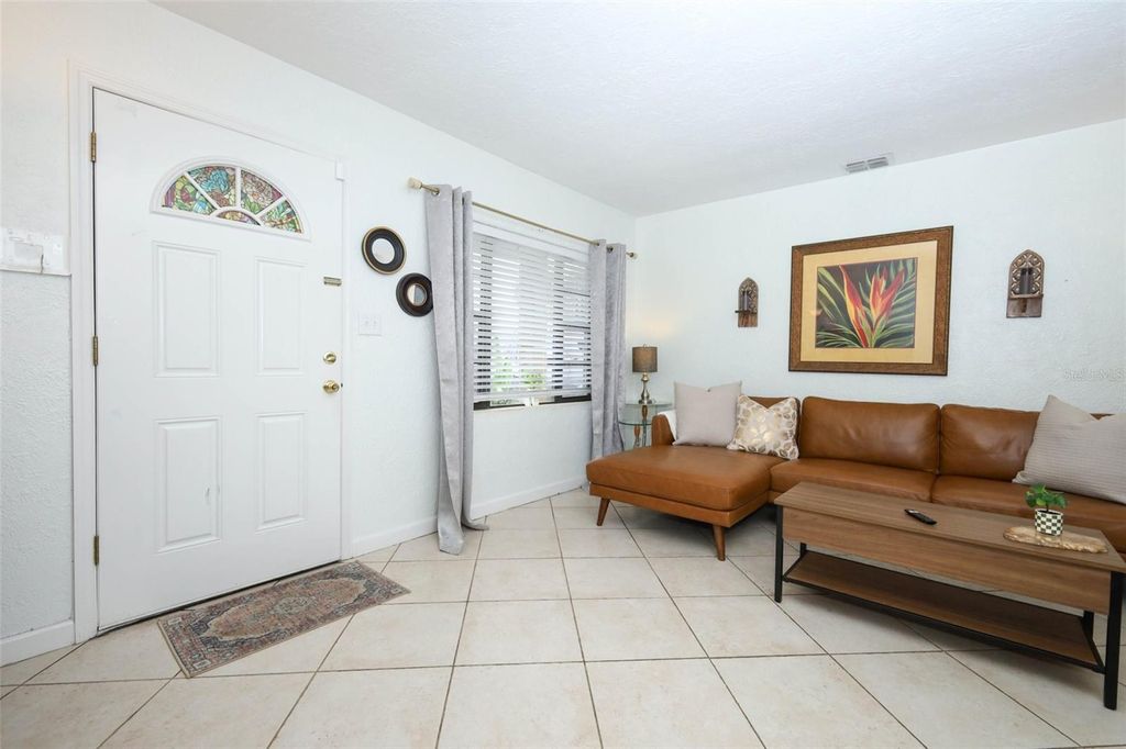 Photo of 410 E Crystal Lake Street, Orlando, FL 32806 (MLS # O6372531)