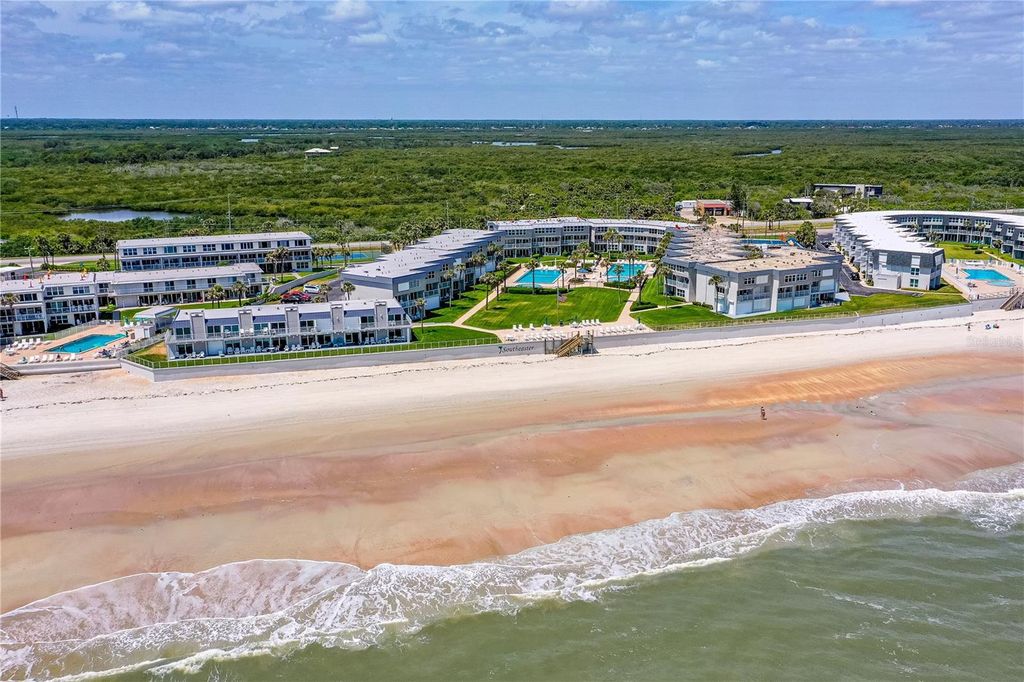 Photo of 4841 S Atlantic Avenue #D202, New Smyrna Beach, FL 32169 (MLS # NS1086853)