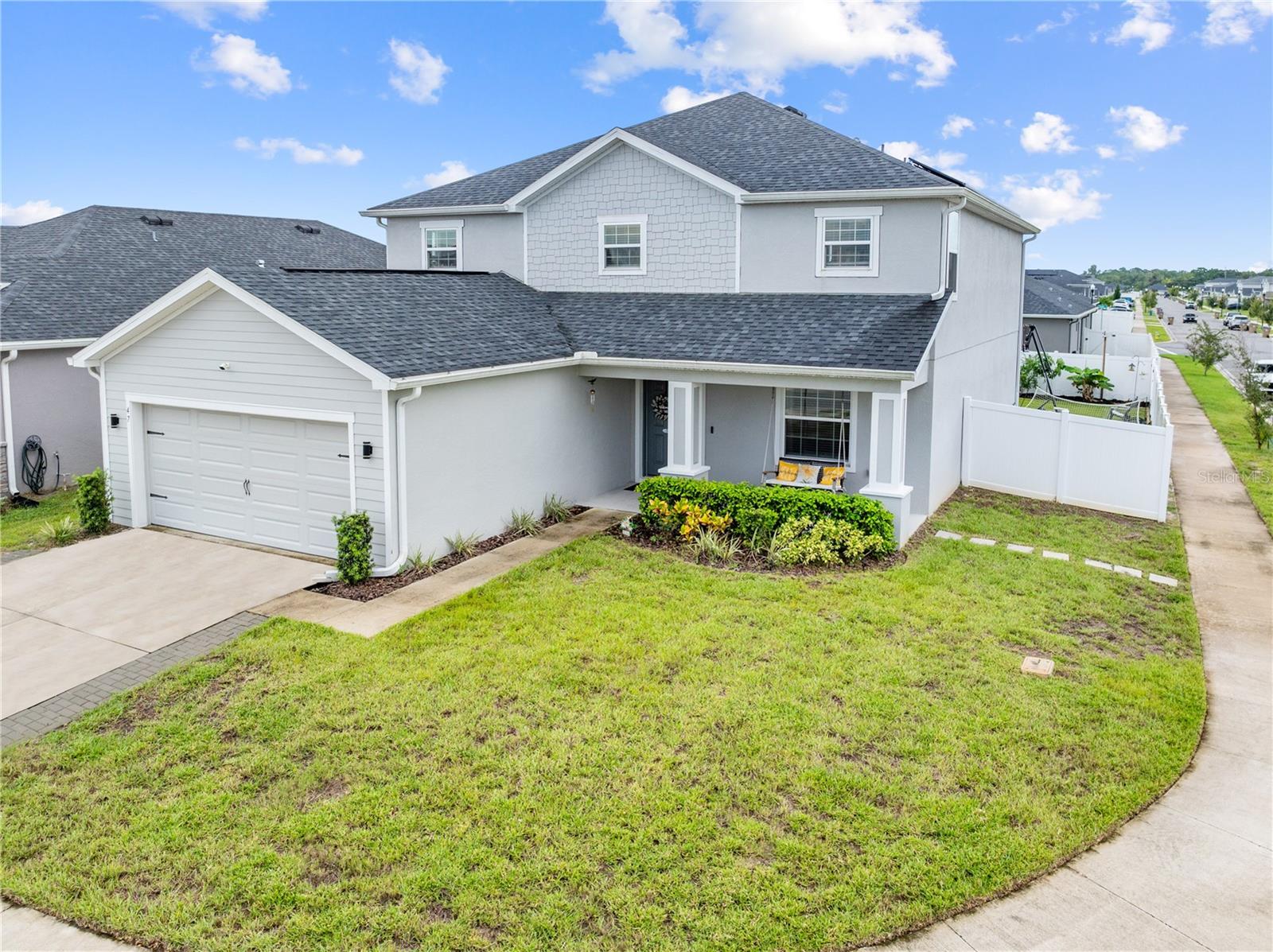 Welcome to this stunning 5-bedroom, 3.5-bathroom, Energy Efficient home, offering modern elegance, high-end finishes, and thoughtful upgrades throughout. Nestled in the sought-after Siena Reserve community of St. Cloud, FL., this home seamlessly blends style and function, making it the perfect retreat. The chef’s kitchen is designed for both beauty and practicality, boasting quartz countertops, stunning brand-new backsplash, and spacious counters—ideal for meal prep and casual dining. The primary suite sits downstairs and is a true sanctuary, complete with a luxurious en-suite bathroom featuring a glass shower enclosure, and dual vanities. The expansive walk-in closet provides plenty of storage. Upstairs holds 4 bedrooms. Each bedroom is generously sized, with 2 bedrooms sharing a jack-and-jill bathroom. Two versatile loft areas provide additional living space, perfect for a media room, home office, Gym or playroom. Convenience is key with an upstairs laundry room and ample storage throughout. Ceiling fans throughout the home Provide enhanced comfort and efficiency. Large sliding glass doors provide an effortless indoor-outdoor flow to the screened in patio that overlooks the fully vinyl fenced backyard. The highlight is the sparkling inground salt water pool, beautifully surrounded by low-maintenance artificial turf. Perfect for relaxation and entertaining year round. Located just minutes from St. Cloud’s or Lake Nona's best dining, shopping, and entertainment, this home offers both convenience and tranquility.
