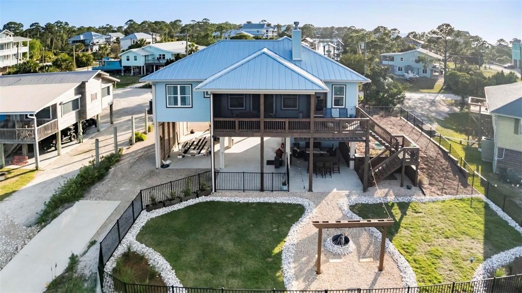 Photo of 331 Land Street, Eastpoint, FL 32328 (MLS # O6401759)