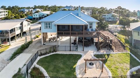 Photo of 331 Land Street, Eastpoint, FL 32328 (MLS # O6401759)