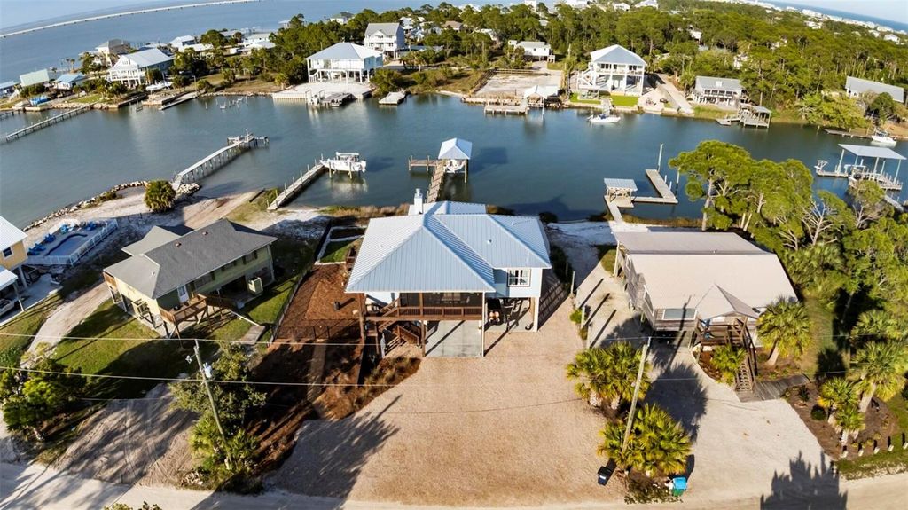 Photo of 331 Land Street, Eastpoint, FL 32328 (MLS # O6401759)