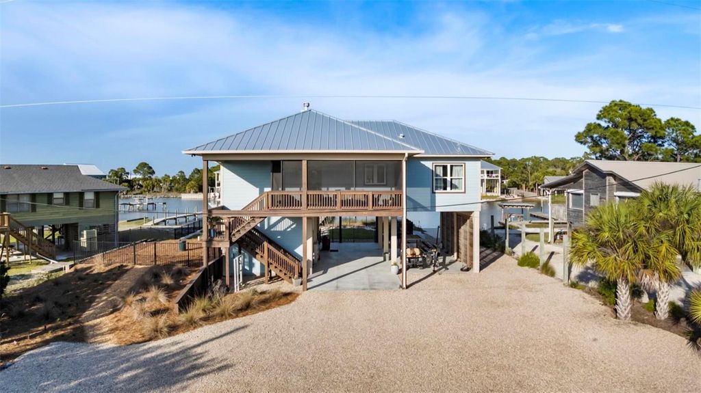 Photo of 331 Land Street, Eastpoint, FL 32328 (MLS # O6401759)