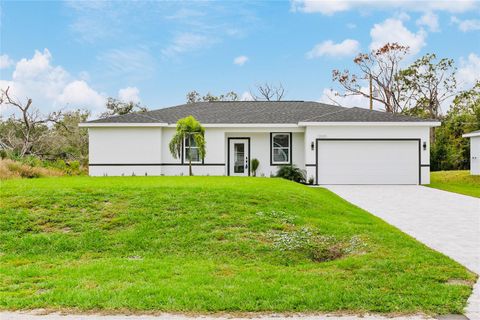 Photo of 19233 Wilton Avenue, Port Charlotte, FL 33954 (MLS # TB8388988)