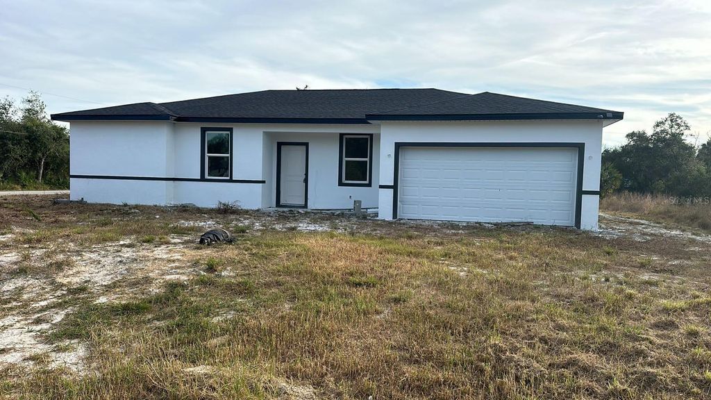 Photo of 19233 Wilton Avenue, Port Charlotte, FL 33954 (MLS # TB8388988)