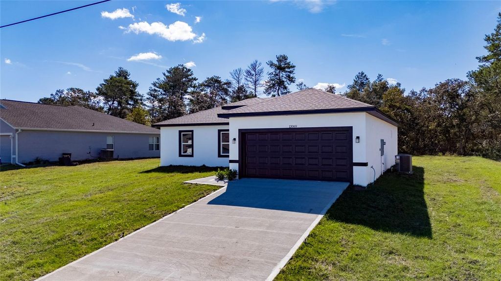 Photo of 13069 SW 35th Circle, Ocala, FL 34473 (MLS # O6358937)