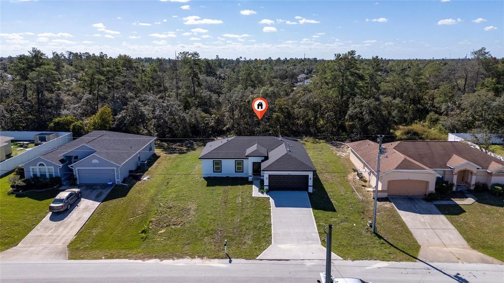 Photo of 13069 SW 35th Circle, Ocala, FL 34473 (MLS # O6358937)