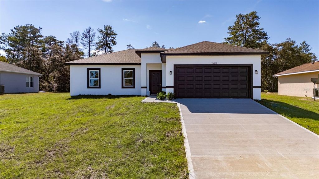 Photo of 13069 SW 35th Circle, Ocala, FL 34473 (MLS # O6358937)