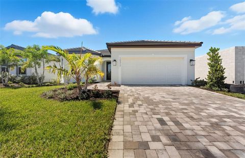 Photo of 10317 Spruce River Way, Parrish, FL 34219 (MLS # TB8407810)