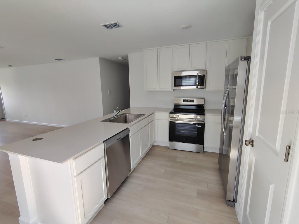 Photo of 5542 Pimenta Court, Kissimmee, FL 34758 (MLS # S5153398)