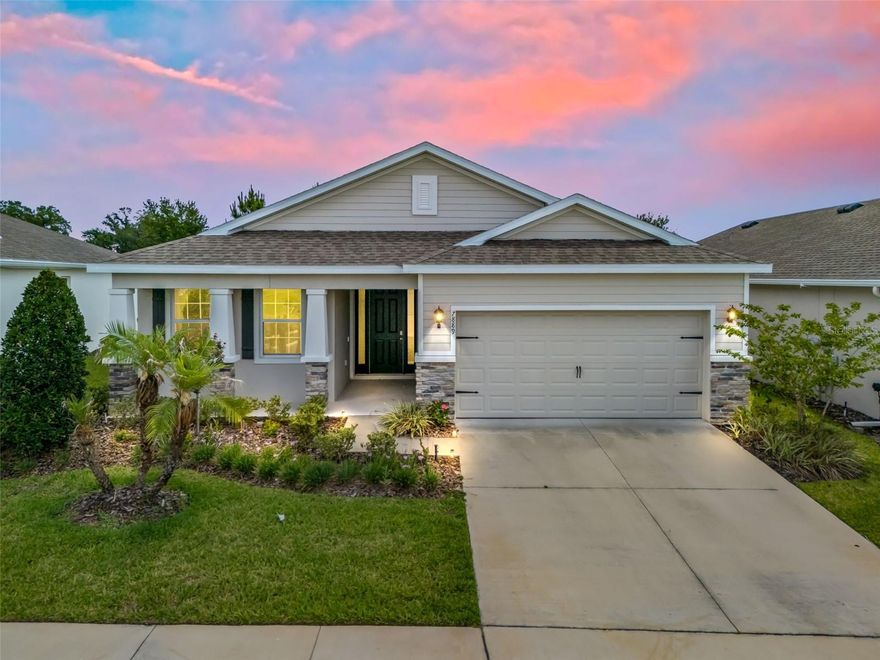 Next to The Villages and located in the family-friendly community of Beaumont North, this home is in a prime and desirable location close to shopping, restaurants, banking, medical facilities, town squares, and within easy access to I-75.



Beautiful curb appeal welcomes you to this cinder block with rebar (concrete block stucco) constructed home with triple columns on the covered front porch, stone accents across the front elevation and garage, accent shutters, and an inviting front entry with sidelights.



With 9.5' ceilings, this spacious three bedroom, two bath home with a two-car garage offers an open concept floor plan perfect for both everyday living and entertaining. Tile flooring flows throughout the main living and wet areas, while the bedrooms feature comfortable carpeting.



The open kitchen is the heart of the home and features a large wet bar with pendant lighting, elongated breakfast bar, stone countertops, crown molding atop the cabinetry, closet pantry, deep stainless steel sink, and a full stainless appliance package. In addition to the formal dining area, the kitchen also offers a convenient eating space for casual dining.



The spacious master ensuite features a trey ceiling, soaking tub, walk-in shower, private water closet, dual sinks with stone countertops, and generous storage space. Bedrooms two and three both include large closets and easy access to the second bath with a tub/shower combination.



Glass sliding doors lead to the covered patio and fully fenced backyard, creating a wonderful outdoor space for relaxing, pets, or gatherings.



Residents enjoy access to multiple community amenities including a beautiful beach entry pool, tennis courts, bocce ball, clubhouse, and scenic walking paths.



Additional upgrades include Safe Haven Security Panel, HVAC with blue light system, circuit breaker protection, separate irrigation water meter, and a garage door opener with automatic lighting.



Conveniently located near the new Target, dining, shopping, and medical facilities, this home offers comfort, convenience, and a fantastic lifestyle.



Schedule your private showing today!