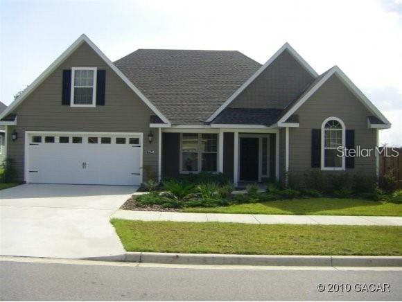 Large 4 bedrooms & 2 baths. Split bedroom plan. Fenced backyard and covered back patio. This Home has crown molding throughout the home, granite counter tops in the kitchen, breakfast nook, separate dining area and a Bonus room ( 4th Bedroom ) over the garage providing multiple uses. Clothes washer & dryer included. large master suite on the first floor. Home is buffered by a large common area on the south side of property. This subdivision is ever growing and conveniently located. Shopping, restaurants, and is an easy 15 min. commute to Shand's hospital, VA Hospital, University of Florida and the I-75 highway.