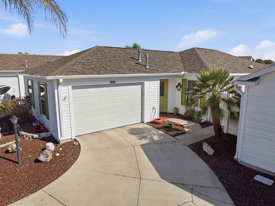 2/2 Amelia Villa in the Village of Poinciana!  GREAT LOCATION Close to Lake Sumter Landing & Brownwood Paddock Square and Golf, Pools, Recreation Centers, Country Club, Restaurants.  ROOF – 2026, HVAC – 2011, HWH – 2022.  Enter through decorative glass front door into Vaulted Ceiling home with large bright kitchen with Solar Tube and can lights, lots of cabinets, Beautiful backsplash, Stainless Steel Appliances with 2 year old refrigerator.  LVP flooring through main living area and both bedrooms, Ceramic Tile in wet areas.  Primary bath has solid surface walk in shower with grab bars and solar tube.  Guest bath is a tub/shower combination.  ENCLOSED LANAI with awning.  Laundry in garage with painted floor.  Notice this villa is located where there are no neighbors across the street and the villa wall is tall.   Low Bond balance $3,521.  Schedule a showing today.