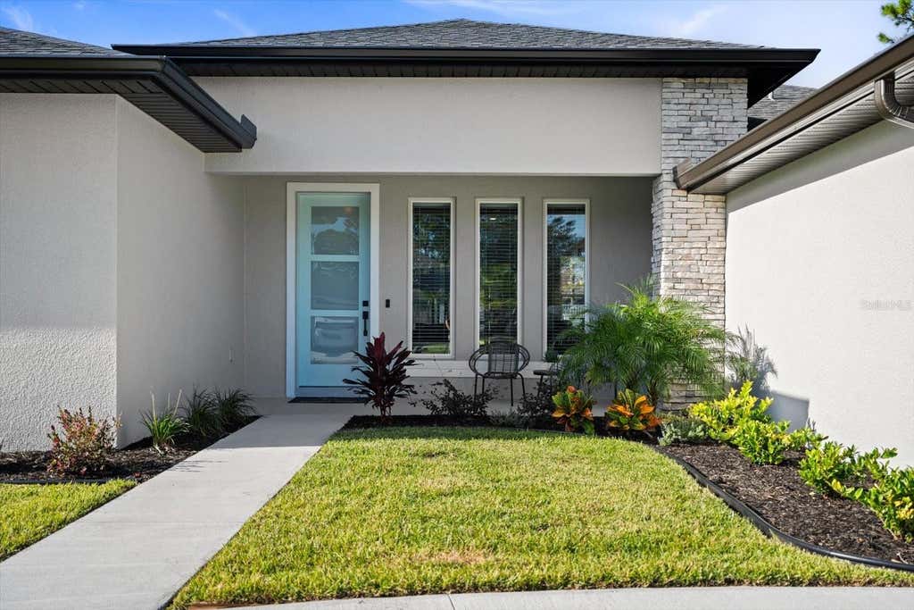 Photo of 94 Forest Hill Drive, Palm Coast, FL 32137 (MLS # FC320623)