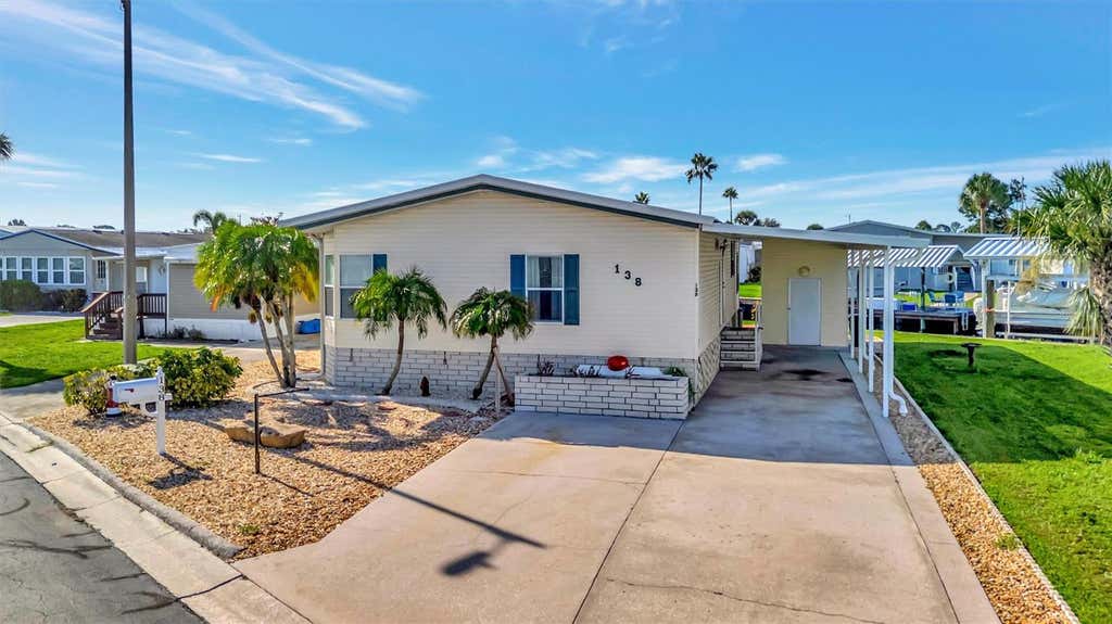 Photo of 138 S Saint Thomas Circle, Apollo Beach, FL 33572 (MLS # TB8537078)