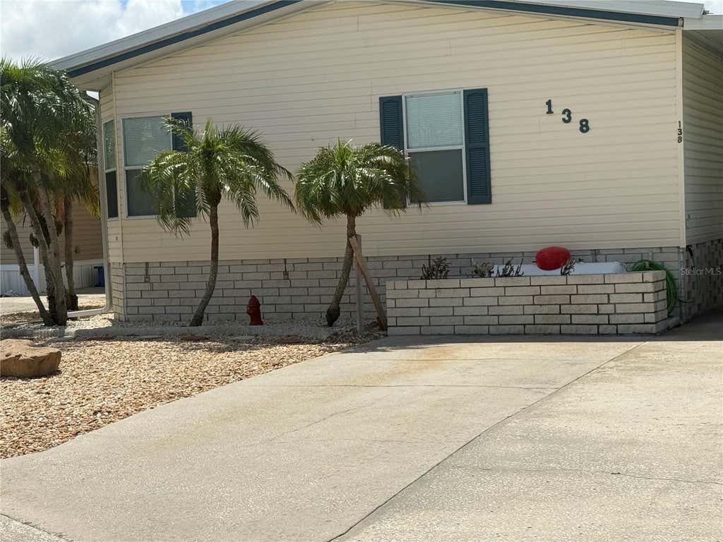Photo of 138 S Saint Thomas Circle, Apollo Beach, FL 33572 (MLS # TB8537078)